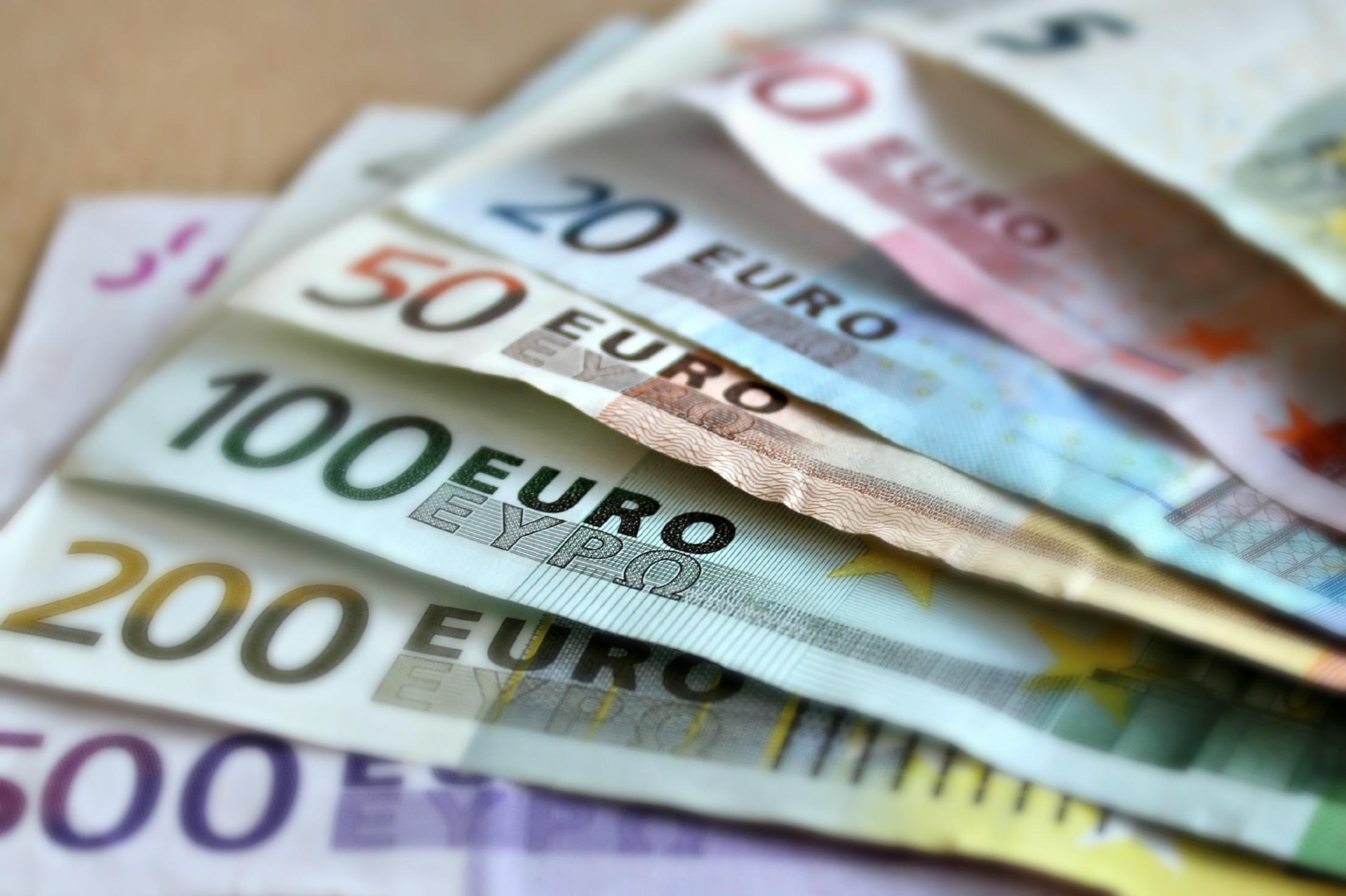 Euro currency notes sitting on a table